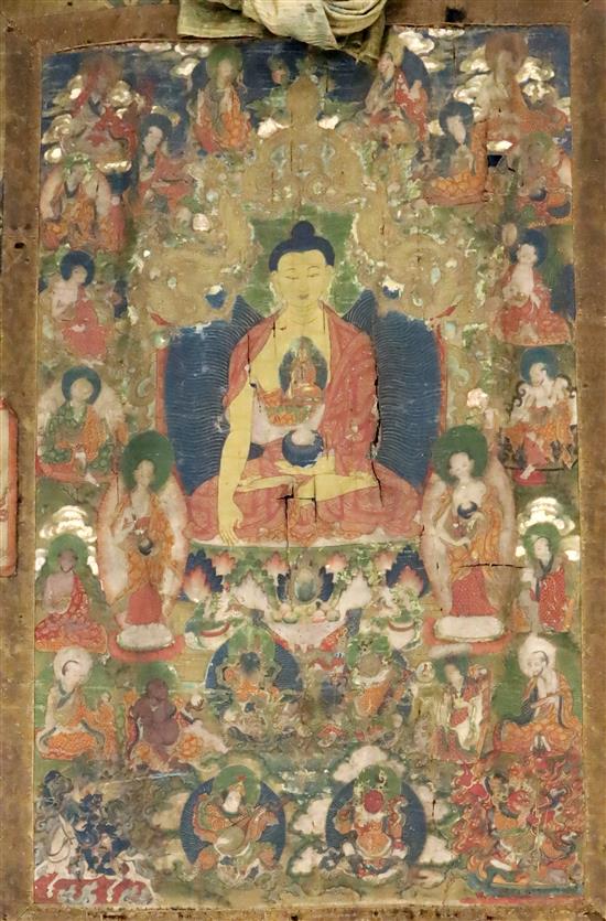 A thangka depicting Buddha Shakyamuni, Tibet, 18th/19th century, Total dimensions 123cm x 75cm, tears